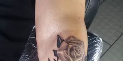 Modest Mastery Tattoo