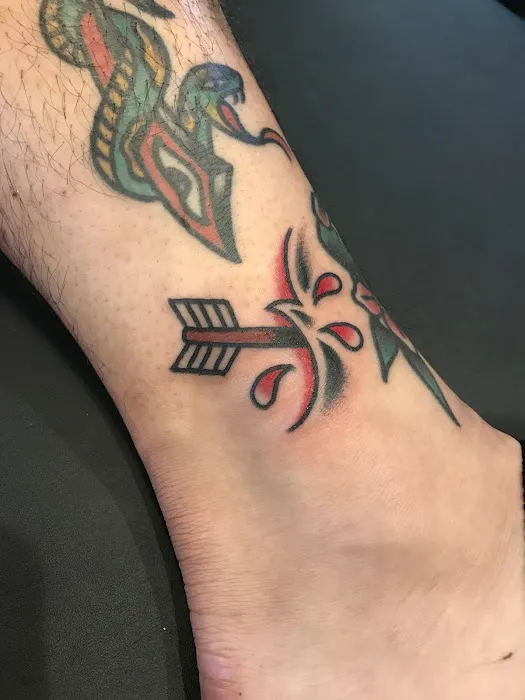 Leviticus Tattoo and Body Piercing 8