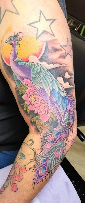 Bombshell Tattoo & Body Piercing 9