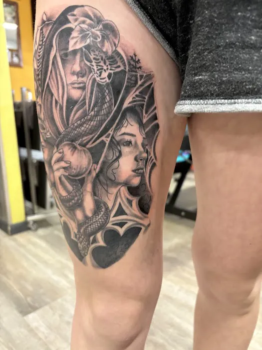 Bombshell Tattoo & Body Piercing 7
