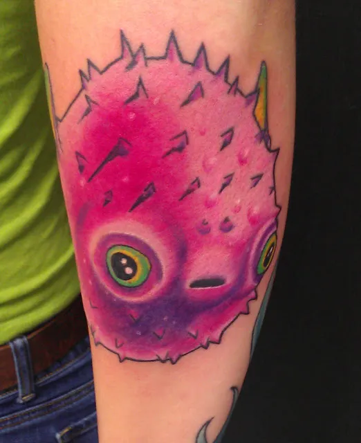 Bombshell Tattoo & Body Piercing 4