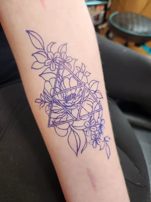 Three Tentacles Tattoo Studio 0